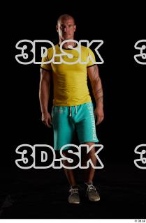 Walking reference of yellow shirt turquoise shorts brown shoes Leland…